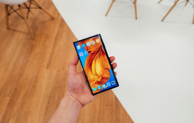 A photo of a android os smartphone on a hand