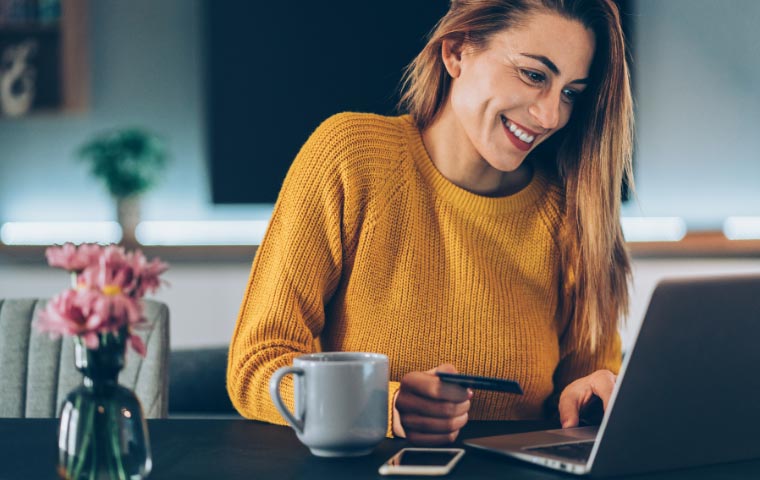 A photo of a woman who has an online shop order.