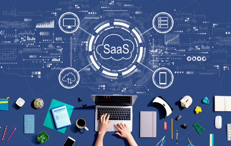 a photo of a laptop and some icons of saas